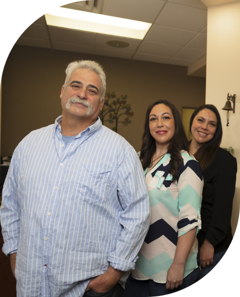 Doctor Keanna and two friendly dental team members