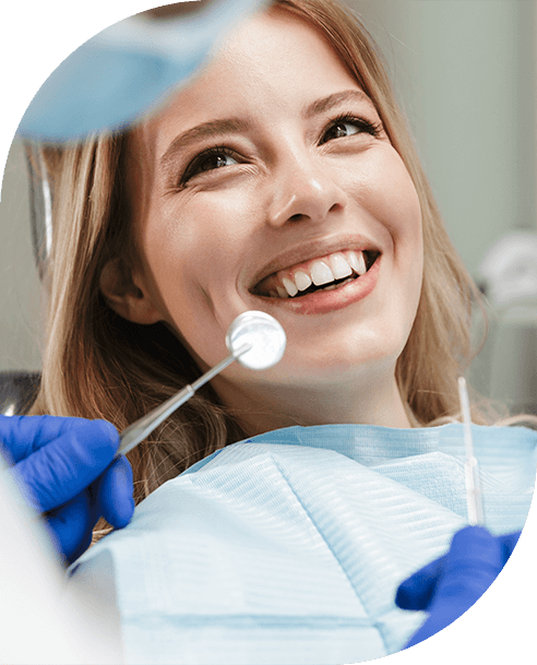 A young woman getting a dental checkup