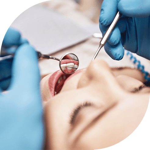 A patient receiving a dental checkup