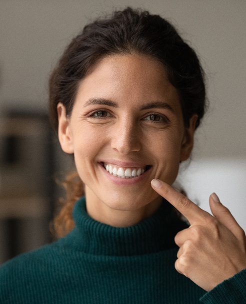 A woman happy with her tooth-colored fillings in Albuquerque