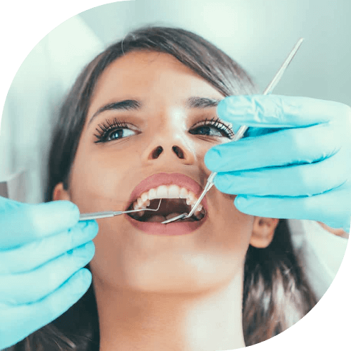 Woman receiving gluten free accommodating dentistry