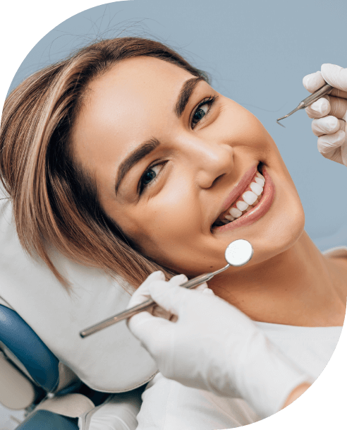 Woman smiling during preventive dentistry visit