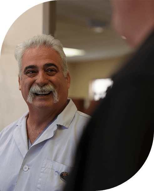 Dentist smiling at dental patient
