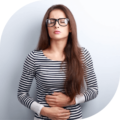 Woman with gluten intolerance holding stomach in pain