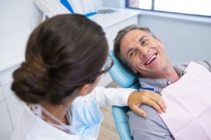 a patient receiving an oral cancer screening